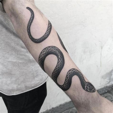 snake forearm tattoo